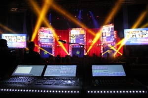 the console where a LD sits to control all of the lights at a live event
